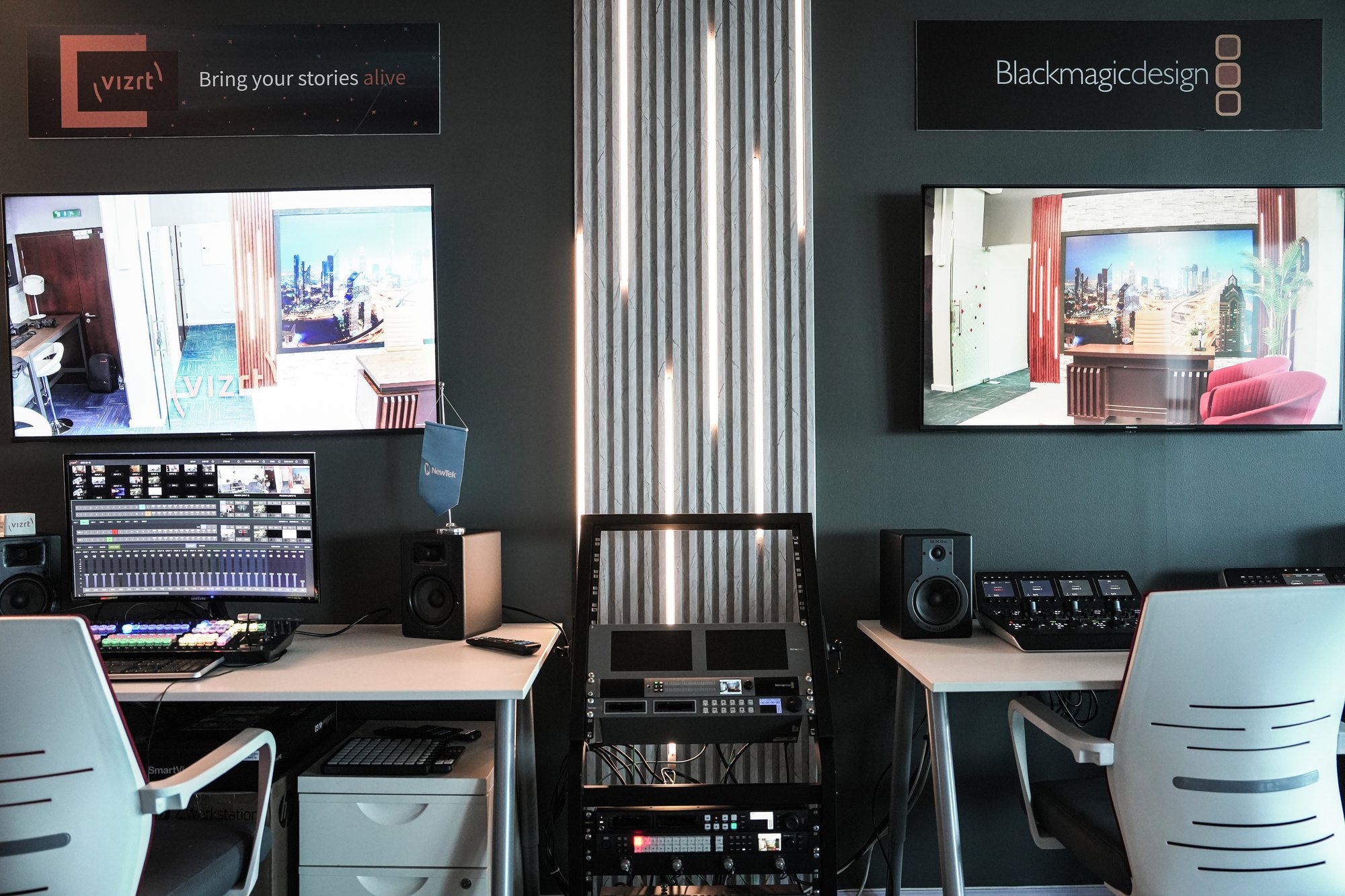 The live production desks at MCX, a multiviewer and switcher at each position