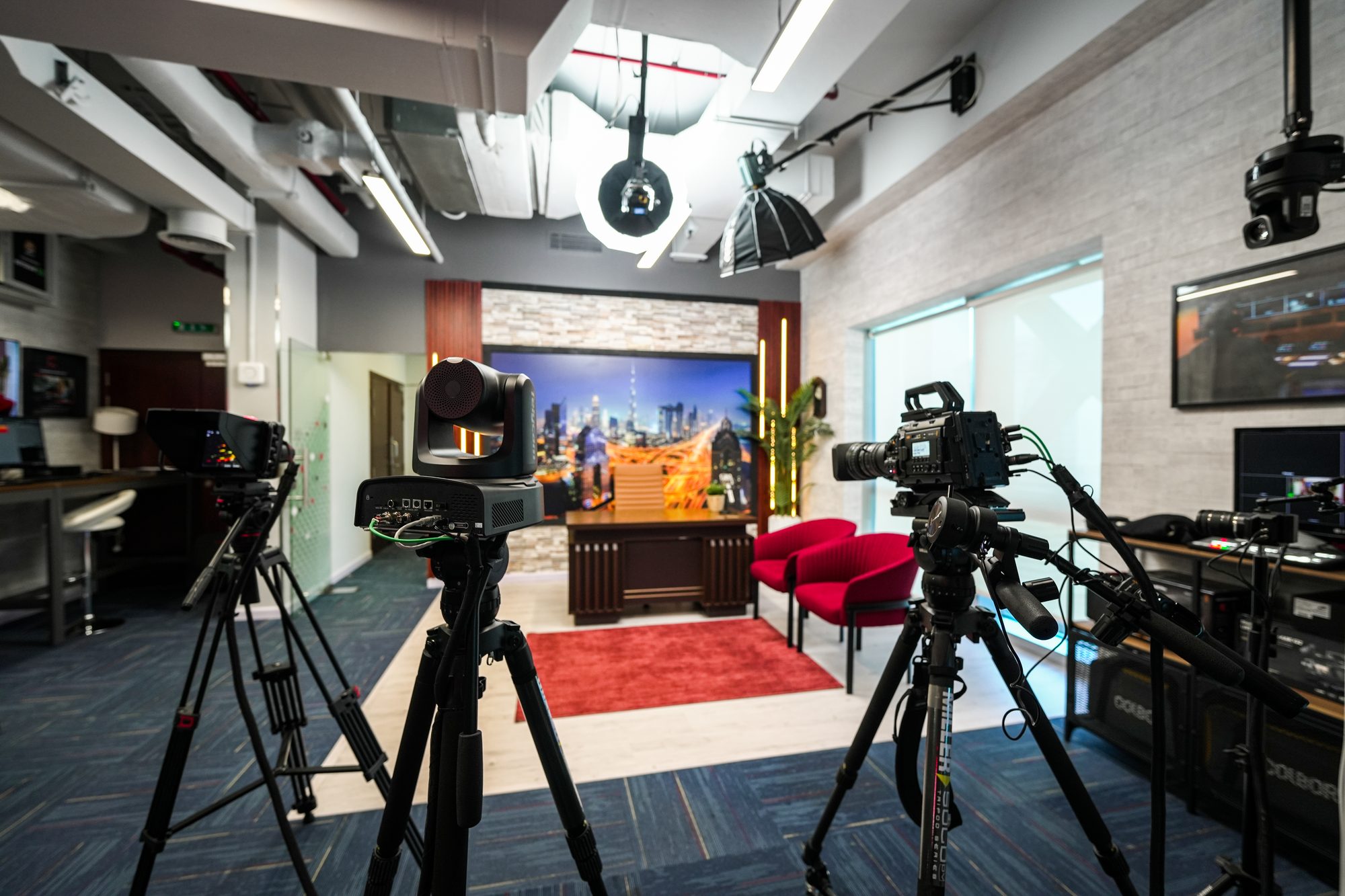 The MCX Dubai studio set, cameras rigged and the Dubai skyline behind